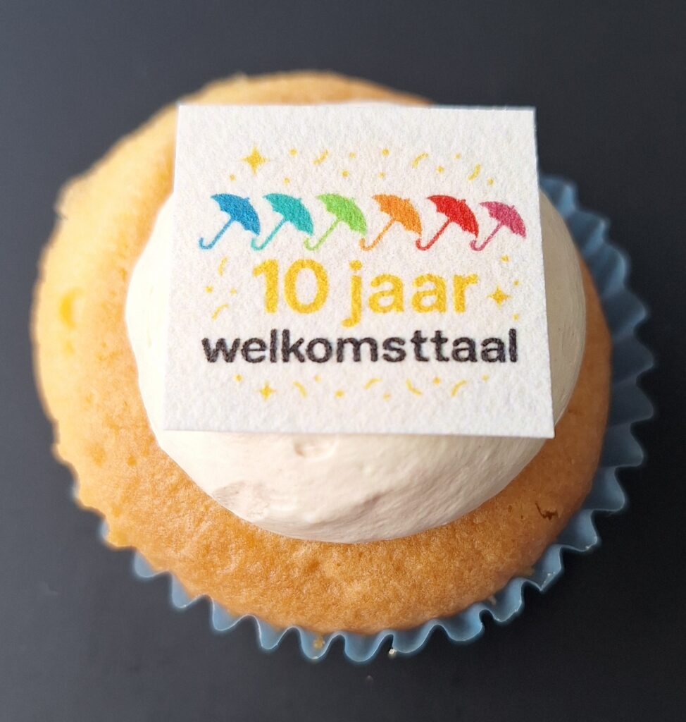 cupcake met logo van Welkomsttaal